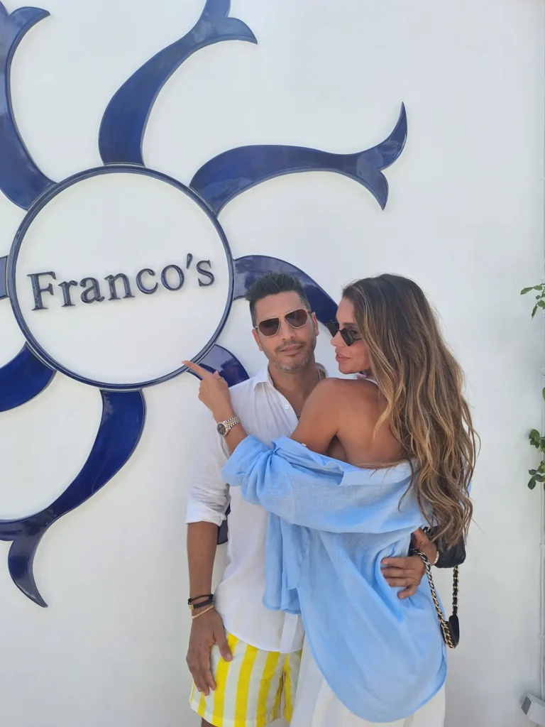 Couple enjoying a scenic moment at Franco's Bar